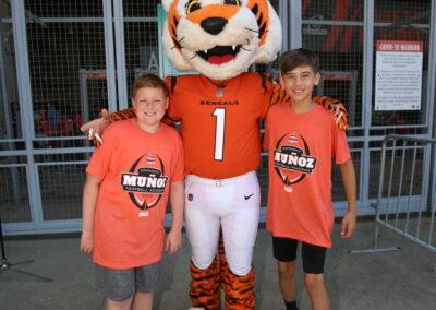 Campers with the Cincinnati Bengals mascot, Who Dey, at Football Academy 2022