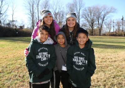 Staff members with campers at Hispanic Character Camp 2022
